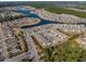 Aerial view of a community featuring lush landscaping, a lake, and well-maintained homes at 517 Poppi Point Ct. # 517, Myrtle Beach, SC 29579