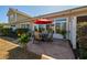 Back patio with outdoor seating, perfect for enjoying al fresco dining in the private backyard at 517 Poppi Point Ct. # 517, Myrtle Beach, SC 29579