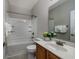 Bathroom with tub-shower combo, neutral color palette, and ample lighting at 517 Poppi Point Ct. # 517, Myrtle Beach, SC 29579