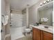 Bright bathroom featuring a shower-tub combo and a vanity with ample storage space at 517 Poppi Point Ct. # 517, Myrtle Beach, SC 29579