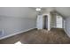 Upstairs bedroom with neutral paint, beige carpet, and a ceiling fan for added comfort at 517 Poppi Point Ct. # 517, Myrtle Beach, SC 29579