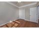 Bedroom featuring hardwood flooring, a ceiling fan, and a closet at 517 Poppi Point Ct. # 517, Myrtle Beach, SC 29579