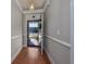 Inviting foyer showcasing gleaming hardwood floors, neutral wall colors, and an open door at 517 Poppi Point Ct. # 517, Myrtle Beach, SC 29579