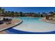 Close up shot of a large community pool with canopies and lounge chairs at 517 Poppi Point Ct. # 517, Myrtle Beach, SC 29579