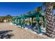 Poolside cabanas with chairs and palm trees at 517 Poppi Point Ct. # 517, Myrtle Beach, SC 29579