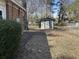 View of the backyard featuring a storage shed, perfect for outdoor projects and storage at 57 Tallahassee Rd., Georgetown, SC 29440