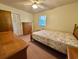 Traditional bedroom featuring light yellow walls, matching furniture, and plenty of natural light at 57 Tallahassee Rd., Georgetown, SC 29440