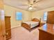 Inviting bedroom with a comfortable bed, light yellow walls, and natural light from the window at 57 Tallahassee Rd., Georgetown, SC 29440