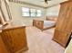 Bedroom with wood furniture, including a bed, dresser, and wardrobe, under a ceiling fan at 57 Tallahassee Rd., Georgetown, SC 29440