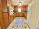 Spacious kitchen featuring wood cabinets, vintage appliances, and a bright window at 57 Tallahassee Rd., Georgetown, SC 29440