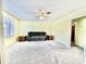 Cozy living room featuring a comfortable sofa and light yellow walls at 57 Tallahassee Rd., Georgetown, SC 29440