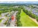 Scenic aerial view of homes next to a golf course, showcasing the neighborhood layout and green spaces at 6095 Catalina Dr. # 1614, North Myrtle Beach, SC 29582