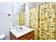 A charming bathroom featuring a vanity with a sink and a shower with curtain at 6095 Catalina Dr. # 1614, North Myrtle Beach, SC 29582