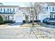 Charming townhome featuring a well-maintained lawn, attached garage, and a welcoming front entrance at 6095 Catalina Dr. # 1614, North Myrtle Beach, SC 29582