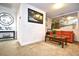 Inviting living room with a comfortable orange sofa, art, and stylish decor at 6095 Catalina Dr. # 1614, North Myrtle Beach, SC 29582