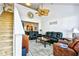Inviting living room with high ceilings, ceiling fan, and comfortable leather seating at 6095 Catalina Dr. # 1614, North Myrtle Beach, SC 29582