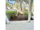 View of townhomes from the front porch, showing landscaping and parking at 721 Painted Bunting Ct. # C, Murrells Inlet, SC 29576