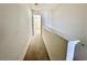 Second story hallway with carpet and view of interior of home at 721 Painted Bunting Ct. # C, Murrells Inlet, SC 29576