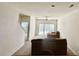 Bright living room featuring neutral walls, carpeted floors, a ceiling fan and sliding door access at 721 Painted Bunting Ct. # C, Murrells Inlet, SC 29576