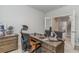 Functional home office with a classic wooden desk and ergonomic chair, designed for comfort and productivity at 729 Choctaw Dr., Conway, SC 29526