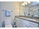 Bathroom featuring white cabinets, granite counters, and a walk-in shower at 753 Moen Pl. # B, Myrtle Beach, SC 29577