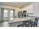 View of kitchen island, complete with granite countertops, stainless steel appliances and barstool seating for two at 753 Moen Pl. # B, Myrtle Beach, SC 29577