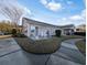 Backyard patio with chairs, and manicured lawn at 80-2 Knight Circle # 2, Pawleys Island, SC 29585