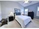 Cozy bedroom featuring a large bed, bedside tables with lamps, and a dark dresser at 80-2 Knight Circle # 2, Pawleys Island, SC 29585