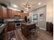 Modern kitchen with a kitchen island, stainless steel appliances, and adjacent laundry room at 80-2 Knight Circle # 2, Pawleys Island, SC 29585