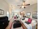 Spacious living room with hardwood floors flowing into dining and kitchen at 80-2 Knight Circle # 2, Pawleys Island, SC 29585