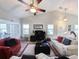 Well-lit living room with vaulted ceiling and a comfortable seating arrangement at 80-2 Knight Circle # 2, Pawleys Island, SC 29585