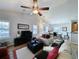 Inviting living room featuring a ceiling fan and seamlessly flowing into the dining area at 80-2 Knight Circle # 2, Pawleys Island, SC 29585