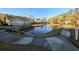 Scenic community pond surrounded by lush greenery and well-maintained homes at 80-2 Knight Circle # 2, Pawleys Island, SC 29585