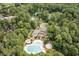 Aerial view of the community featuring swimming pools, tennis courts, and lush landscaping at 921 Heshbon Dr., North Myrtle Beach, SC 29582