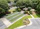 Aerial view of bocce ball court, garden area and gazebo in a meticulously landscaped community at 921 Heshbon Dr., North Myrtle Beach, SC 29582