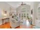 Bright living room with a fireplace, vaulted ceilings, built-in shelving and plenty of natural light at 921 Heshbon Dr., North Myrtle Beach, SC 29582