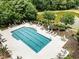 Aerial view of community pool with lap lanes, hot tub, and poolside seating at 921 Heshbon Dr., North Myrtle Beach, SC 29582