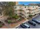 Aerial view of the exterior of a condominium complex with outside stairs and landscaping at 9661 Shore Dr. # A-21, Myrtle Beach, SC 29572