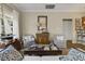 Nautical-themed living room with comfortable seating and coastal accents at 98 Wallys Way # 1, Pawleys Island, SC 29585