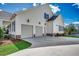 Well-maintained home exterior featuring a spacious three-car garage and manicured lawn at 1006 James Island Ave., North Myrtle Beach, SC 29582