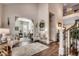 Bright foyer featuring stylish decor, hardwood flooring, and a glimpse into the adjacent living spaces at 1006 James Island Ave., North Myrtle Beach, SC 29582
