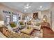 Bright living room featuring comfortable seating, natural light, and decorative fireplace at 1006 James Island Ave., North Myrtle Beach, SC 29582
