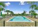 Inviting community pool area with plenty of lounge chairs and lush landscaping at 1006 James Island Ave., North Myrtle Beach, SC 29582