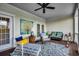 Inviting porch with wicker furniture, a ceiling fan, and scenic views at 1006 James Island Ave., North Myrtle Beach, SC 29582