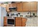 Well-appointed kitchen with stainless steel appliances and granite countertops at 1024 Stanton Pl. # 1024, Myrtle Beach, SC 29579