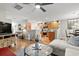 Open-concept living area flowing into a kitchen with warm wood cabinets at 1024 Stanton Pl. # 1024, Myrtle Beach, SC 29579