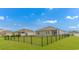 Well maintained backyard featuring a black fence surrounding green grass, creating a secure and private outdoor space at 1119 Maxwell Dr., Little River, SC 29566