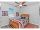 Comfortable bedroom with a ceiling fan, and natural light at 1119 Maxwell Dr., Little River, SC 29566