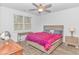 Bright bedroom with wood floors, ceiling fan, and modern furnishings creating a comfortable retreat at 1119 Maxwell Dr., Little River, SC 29566