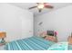 Bedroom featuring a wood-frame bed, ceiling fan, and a dresser at 1119 Maxwell Dr., Little River, SC 29566